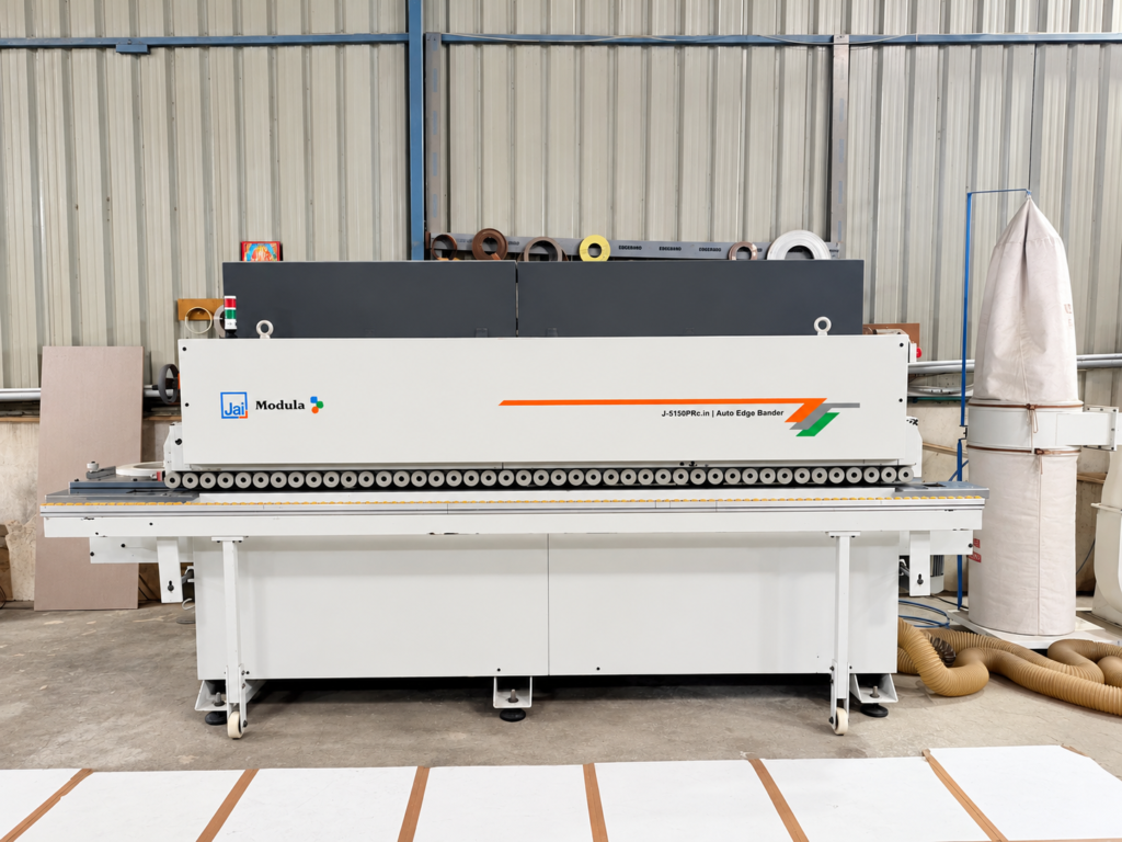 Edge banding machine used to finish modular furniture panels in our factory